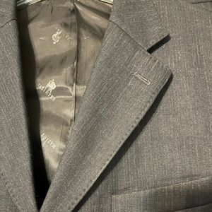 British tailoring double vent suit.